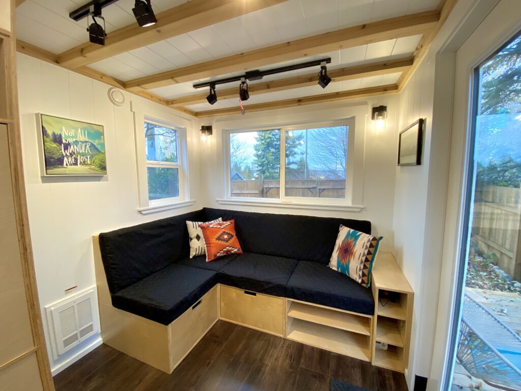 Tiny home requiring stair cabinetry, storage couch and living room shelving.
